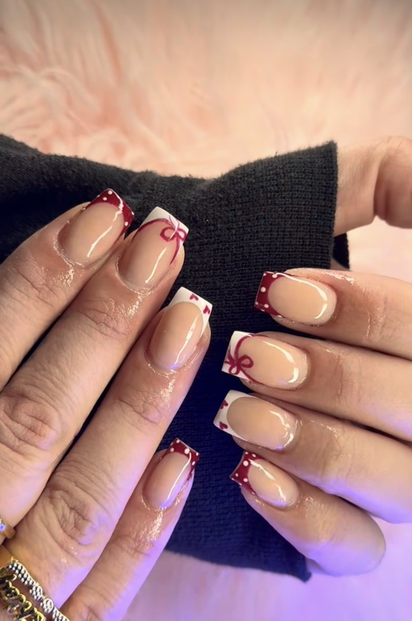 Multi-color abstract nail art in blue, orange, pink and grey